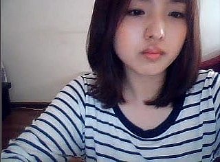 koreanisches Mädchen auf Web-Cam